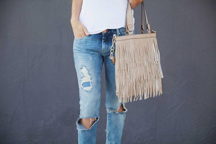 Spodnie z dziurami - do czego je nosić? Spodnie z dziurami - do czego je nosić?